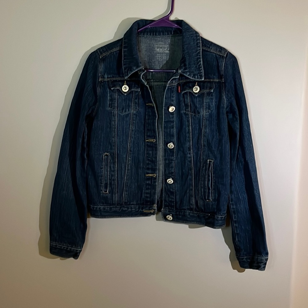 A Jean jacket with diamond buttons from levi’s